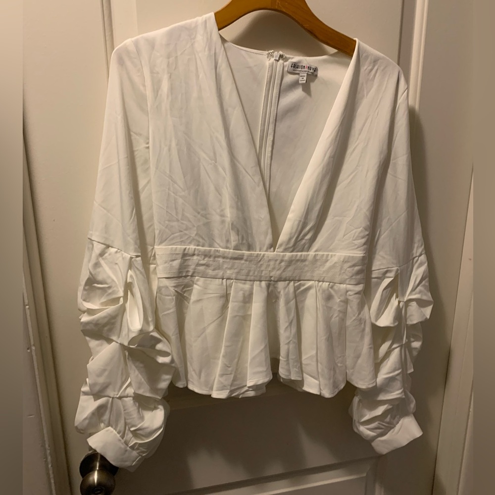 Fashion Nova, Sz L, Peplum Top, Ivory. Low cut in the front, very cute and sexy